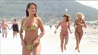 Hot Women In Bikinis On The Beach Of Ibiza