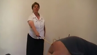 Milf Gets Caned By Older Woman In Hardcore Video