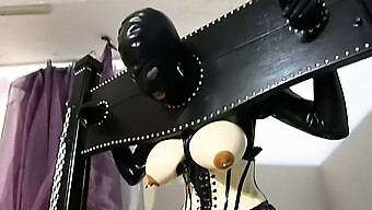 Humiliating Teen Gets Tied Up And Fucked In Rubber Suit